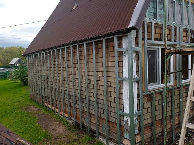 Облицовка дома фасадными панелями в деревне Антоновка